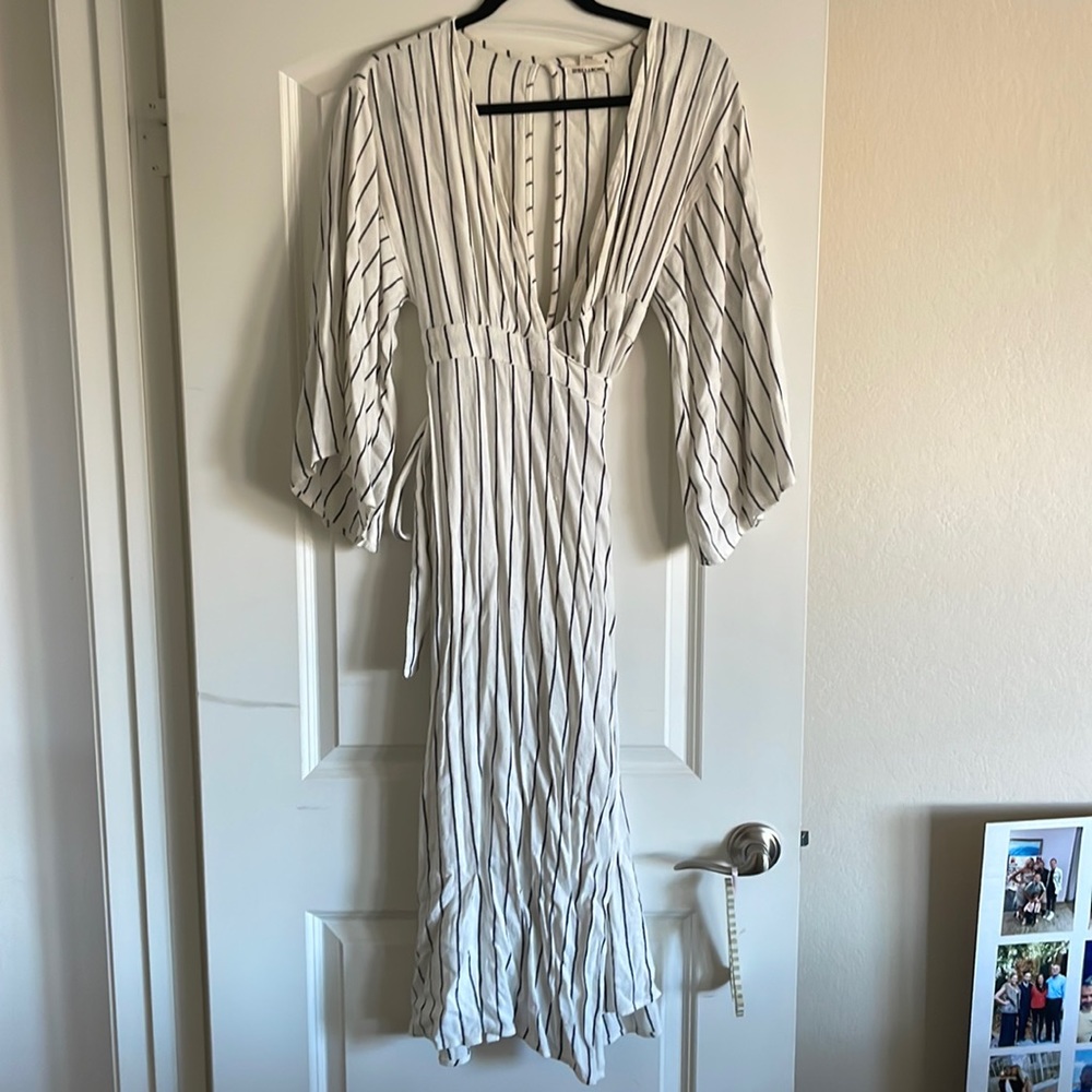 Dark blue stripped and white dress. Super cute for lunch by the beach.